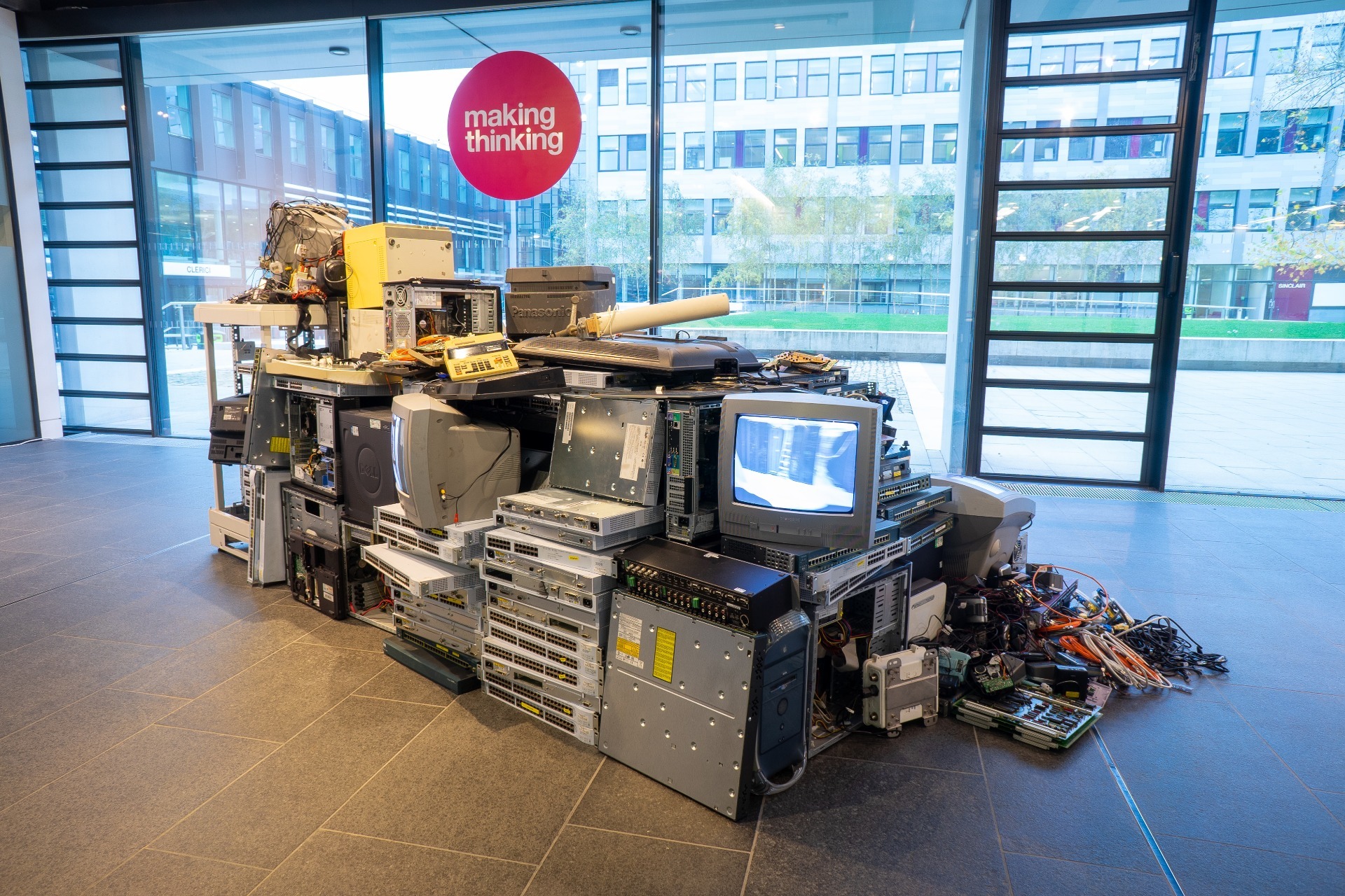 Local Area Network  -  iWaste eWaste 2, 2019. Video installation: monitors, cables, pc towers, exchange boxes, peripherals.